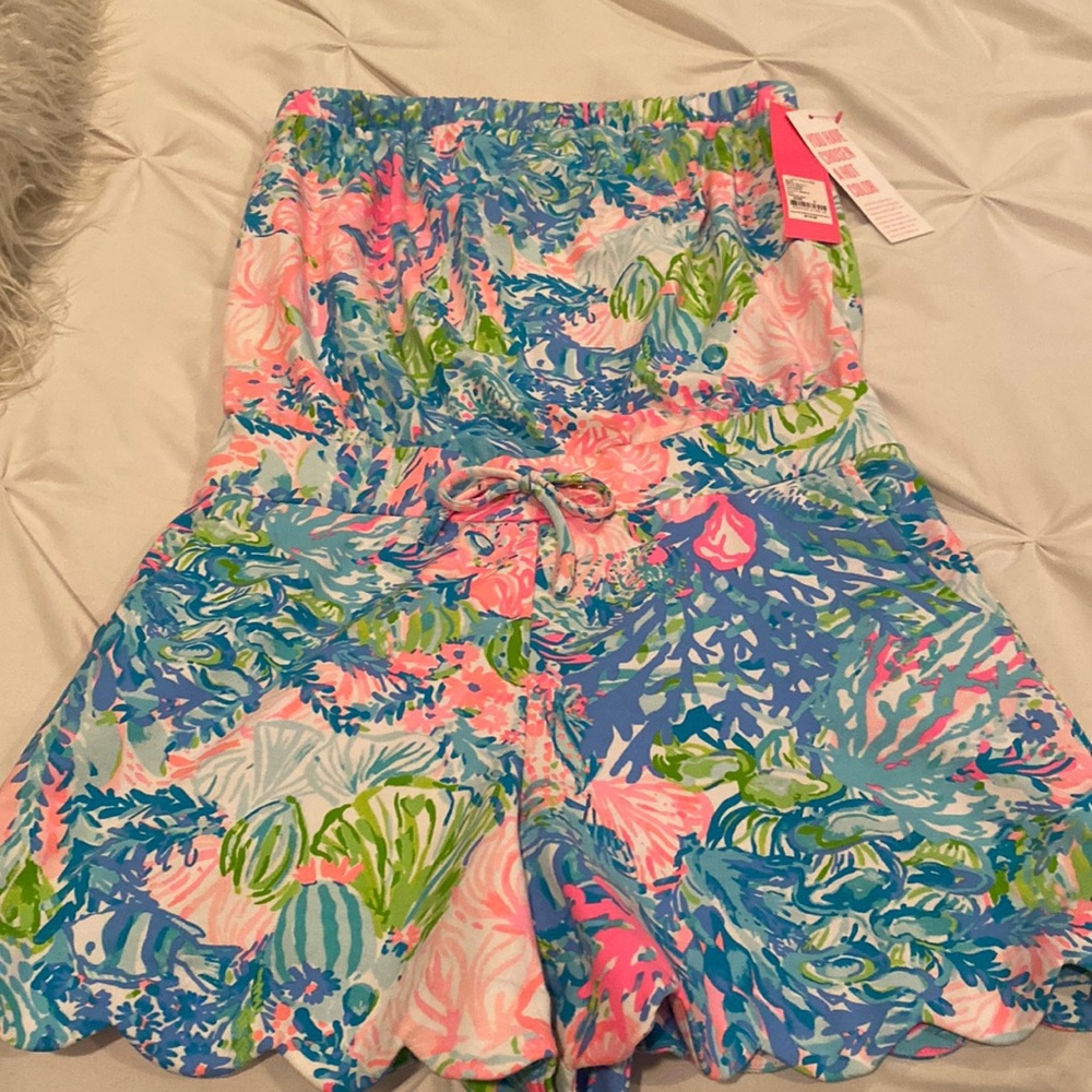A hot color Lilly Pulitzer Romper!